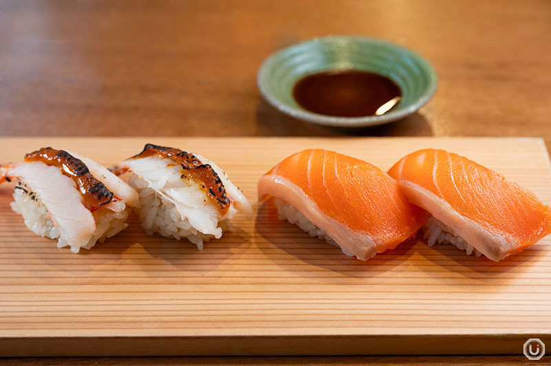  Seared Shrimp with Uni Sauce (left), Drinkable Salmon (right) both two pieces for 384 JPY (tax included)