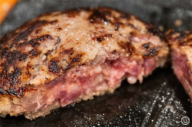Photo of a cross-section of hamburger steak