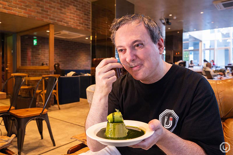 Photo of Umami bites writer Bensky enjoying a matcha dessert