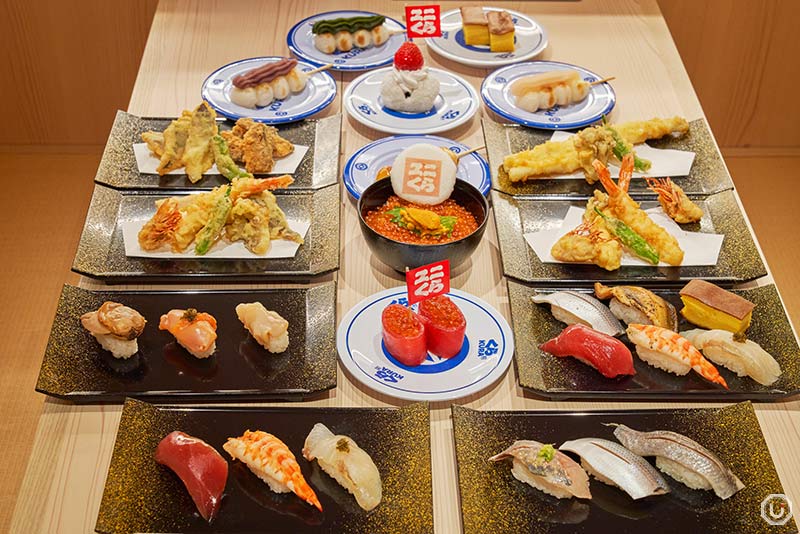 Photo of sushi, tempura, and dango at Kura Sushi in Ginza