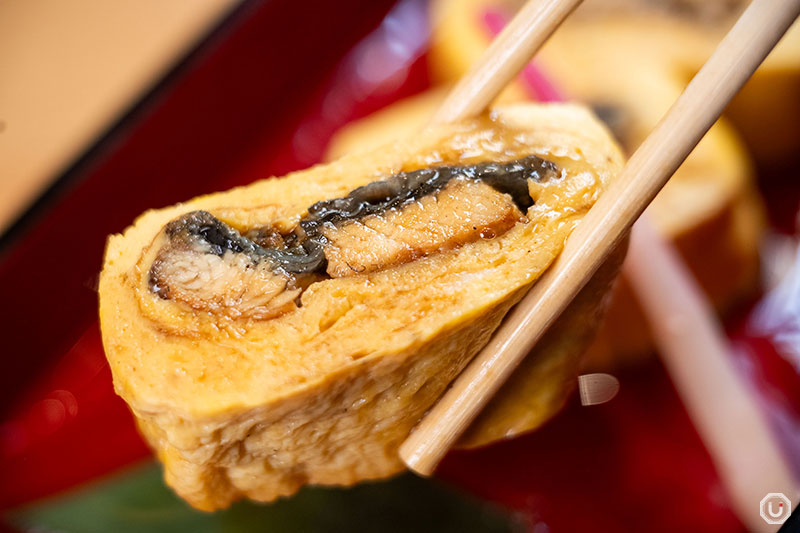 Akihabara Unasho which wraps chopped unagi in a thick Japanese rolled omelet