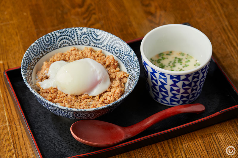 Photo of Famous seasoned minced chicken on rice topped with onsen tamago