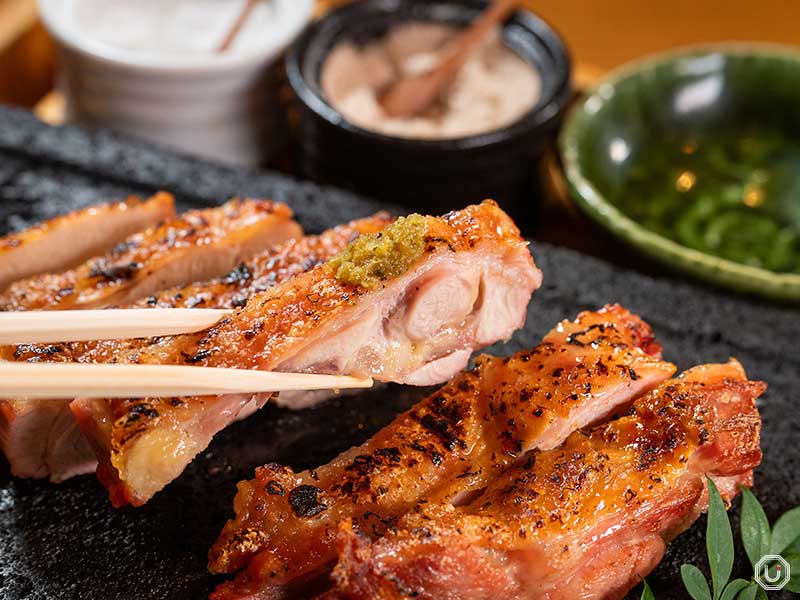 Grilled chicken thighs at the Hakata Jidori Fukuei Association in Shibuya