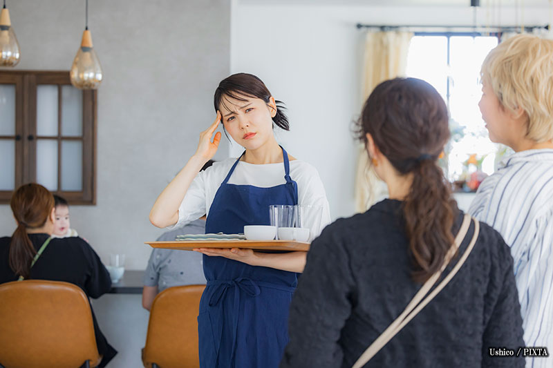 a waitress dealing with customer harassment in a Japanese restaurant