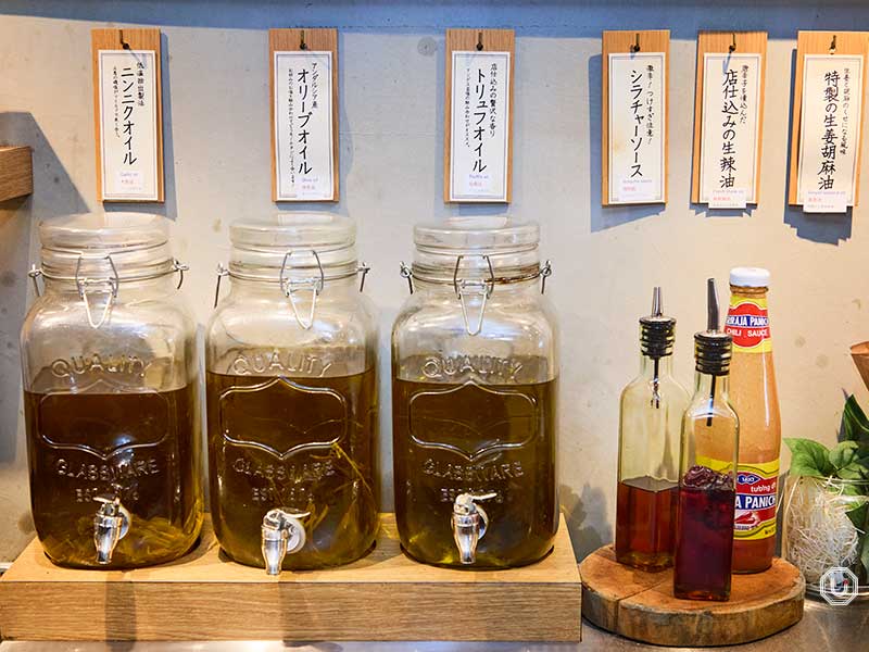 A wide selection of condiments available at Shabu-Shabu Retasu