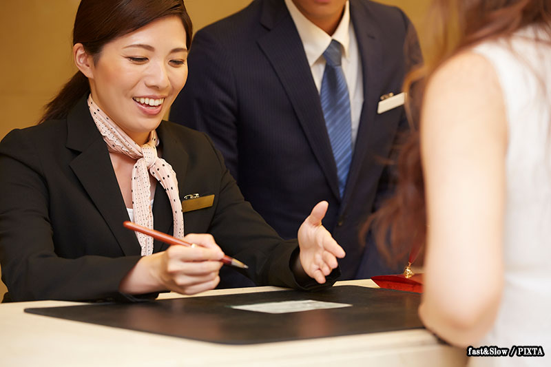 Photo of checking in at a Japanese hotel