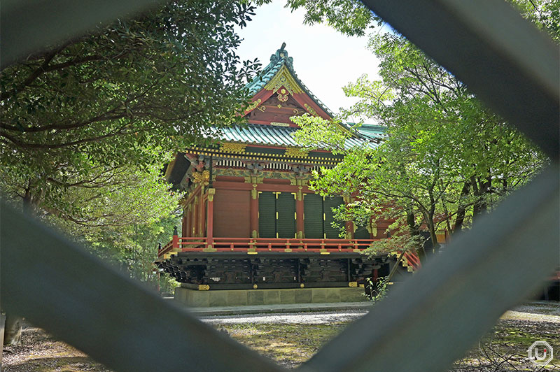 View of the shrine buildings through the fence