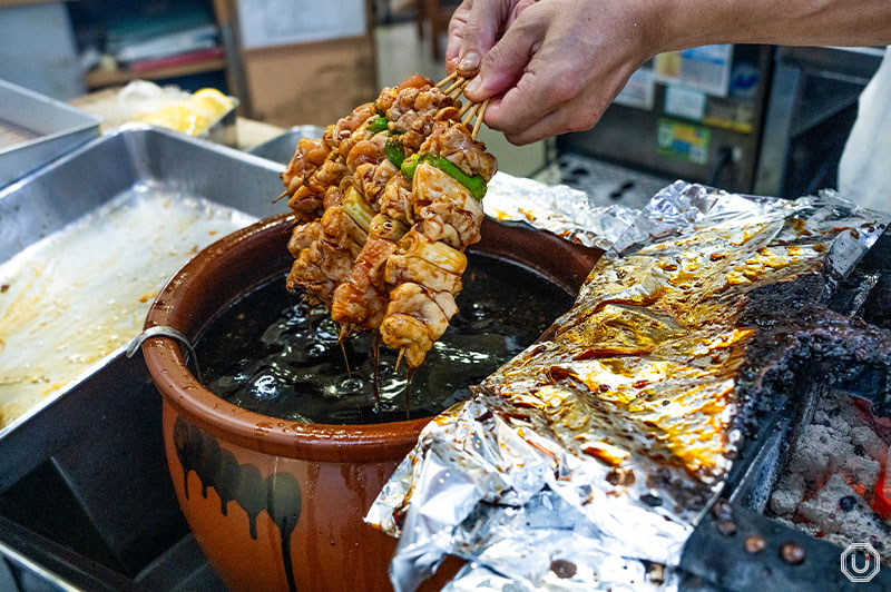 Yakitori dipped in sauce