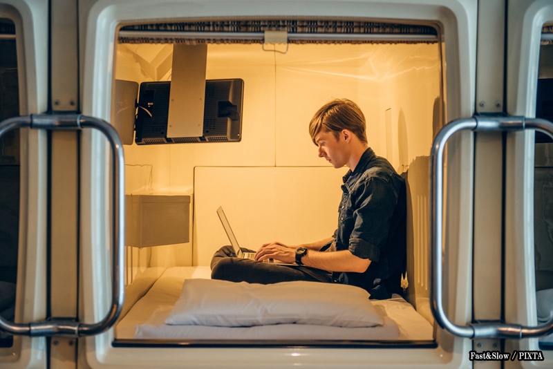 tourist using a capsule hotel in Japan