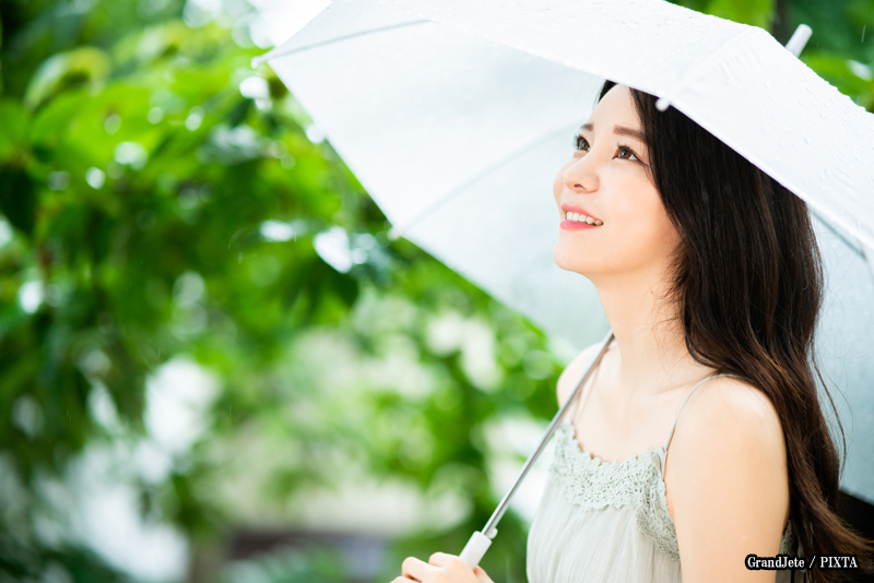 Japanese woman holding an umbrella