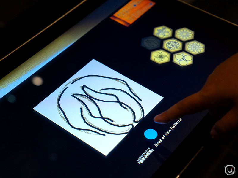 Interactive exhibit where visitors can recreate kimono patterns designed by Hokusai